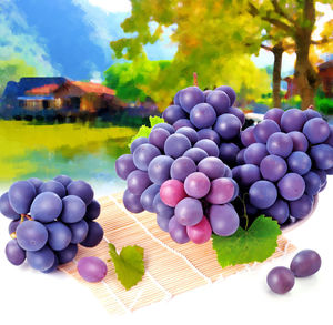 Close-up of grapes on table