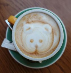 Close-up of cappuccino on table