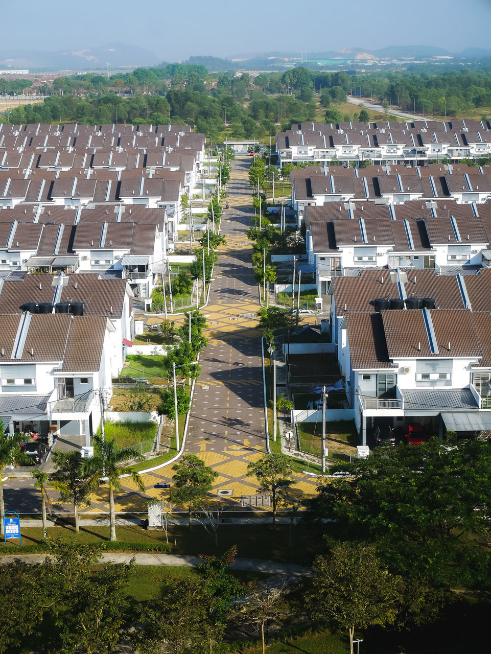 residential area, aerial photography, architecture, neighbourhood, suburb, bird's-eye view, built structure, building exterior, building, high angle view, urban area, nature, city, plant, urban design, environment, tower block, residential district, downtown, house, environmental conservation, stadium, day, outdoors, cityscape, no people, tree, roof, condominium, metropolitan area, in a row, aerial view