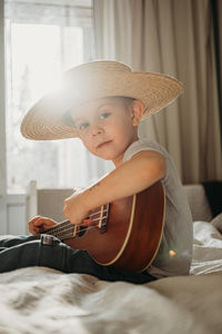 Young woman playing guitar