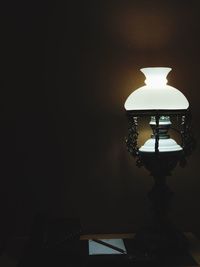 Illuminated lamp in dark room