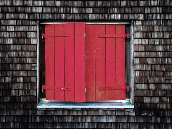 Red closed door of building