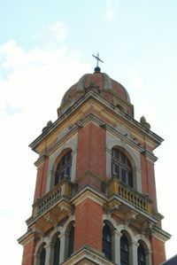 Low angle view of statue against sky