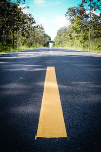 Arrow symbol on road in city