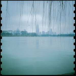 Close-up of lake against sky