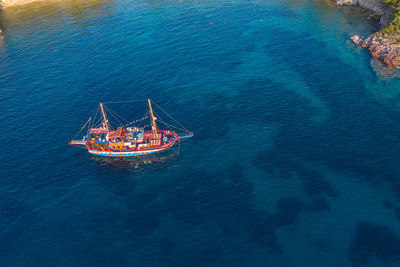 Aerial view of sailboat sailing in sea