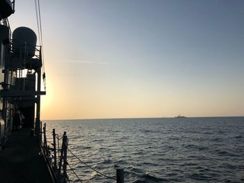 Scenic view of sea against clear sky during sunset