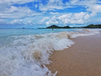 Scenic view of beach against sky