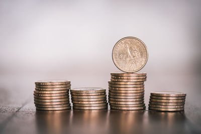 Close-up of coins on table