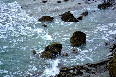 Waves splashing on rocks