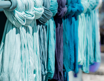 Close-up of clothes hanging in store for sale