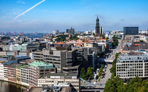 High angle view of buildings in city against sky