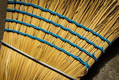 High angle view of broom on floor