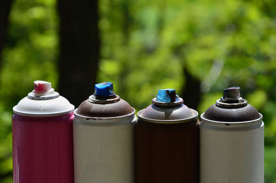Close-up of spray cans