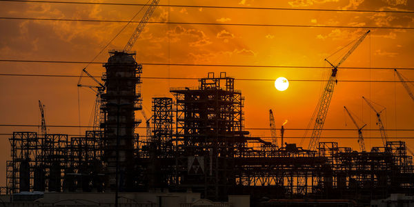 Sunrise over kuwait south oil refining plant