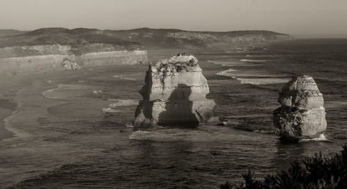 View of rock formation in sea