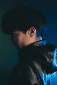 Portrait of young man looking away