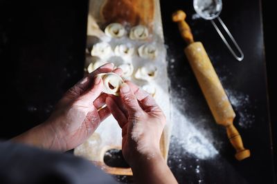 High angle view of person preparing food