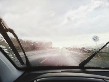 Road seen through car windshield