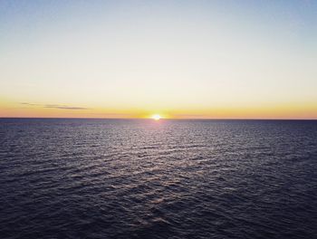 Scenic view of sea at sunset