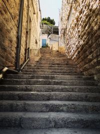 Low angle view of staircase leading towards building