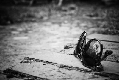 Close-up of abandoned bicycle on street