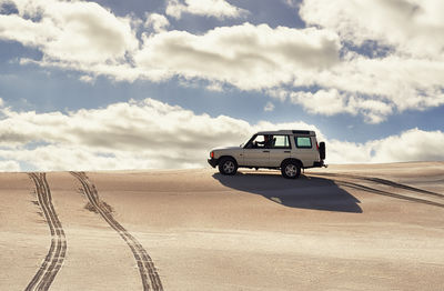 Car on sand at desert