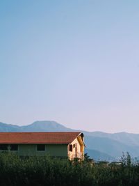 House against clear blue sky