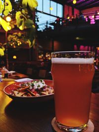 Close-up of beer in glass on table