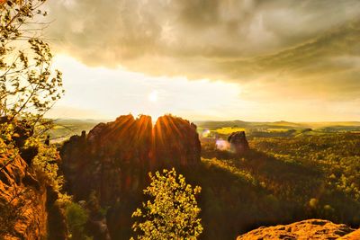 Scenic view of landscape against sky during sunset