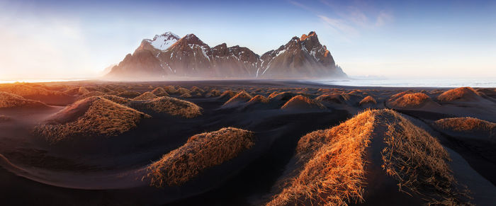 Panoramic view of sea against sky during sunset