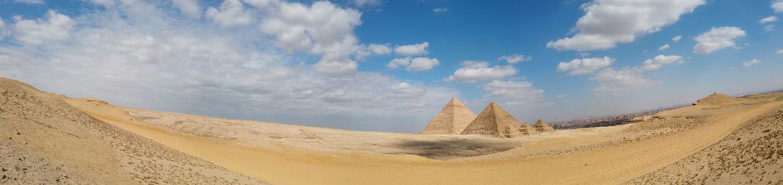 Panoramic view of desert against sky