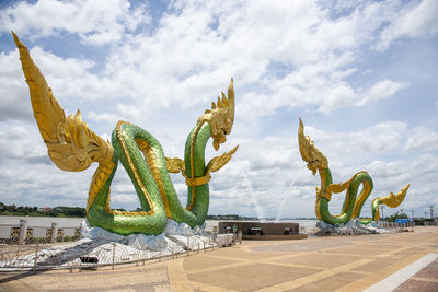 Twin green naga statue at the mekong river, wat lamduan temple, nong khai province thailand.