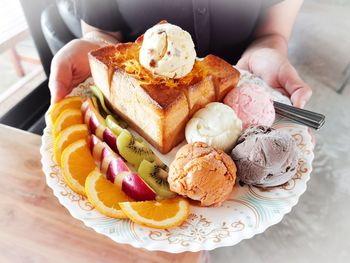 High angle view of dessert in plate on table