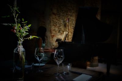 View of wine glasses on table in restaurant