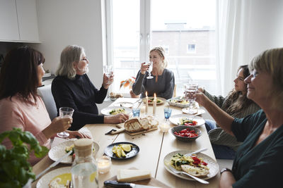 Family having drinks during dinner