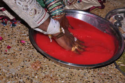 Low section of woman sitting on floor