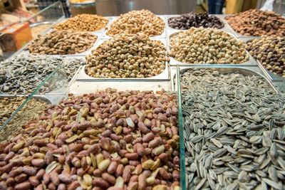 Collection of dried nuts, pistachio and seeds at oriental market, bazaar