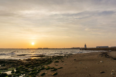 Scenic view of sea against sky during sunset