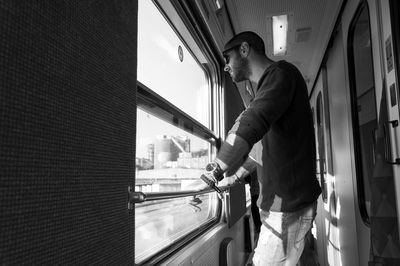 Man standing in train