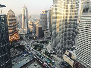 High angle view of buildings in city against sky