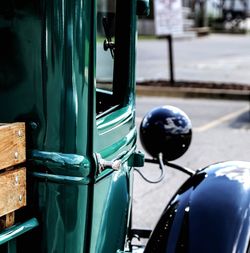 Close-up of motorcycle on side-view mirror