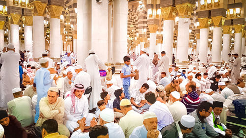 Group of people in temple against building