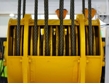 Close-up of yellow container at construction site