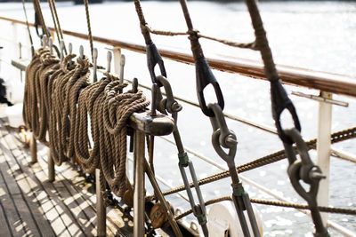 Close-up of rope tied to railing