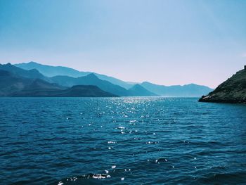 Scenic view of sea against cloudy sky