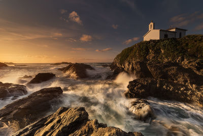 Scenic view of sea against sky during sunset