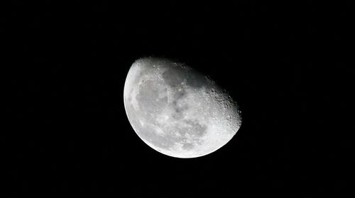 Low angle view of moon in sky