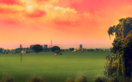Scenic view of landscape against sky during sunset