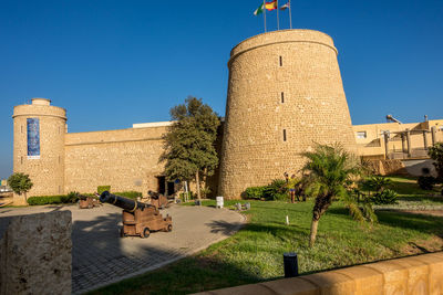 View of historic building against blue sky